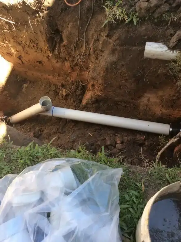 New PVC drain jump-up connection in a dug-out trench