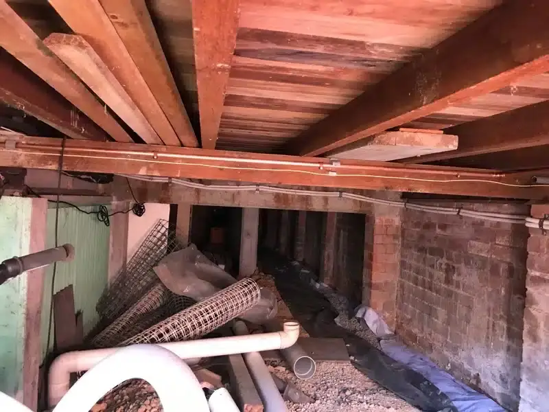 Water service pipes in the void under a house